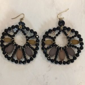 Black and neutral beaded earrings.